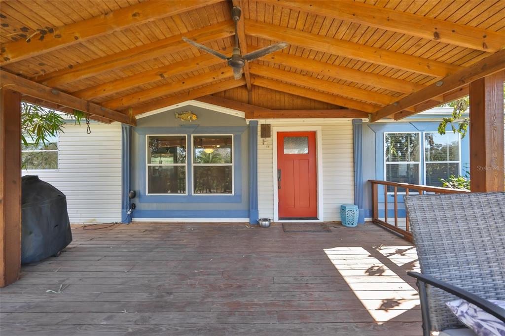 20112 Hobbs Road Wimauma, FL 33598 - Photo 10 of 94 a front view of a house with a large window