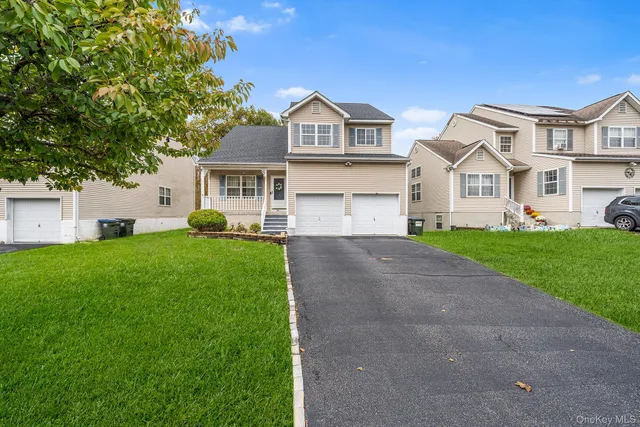 a view of outdoor space yard and front view of a house