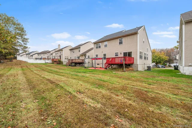 a view of an ocean with beach and garden