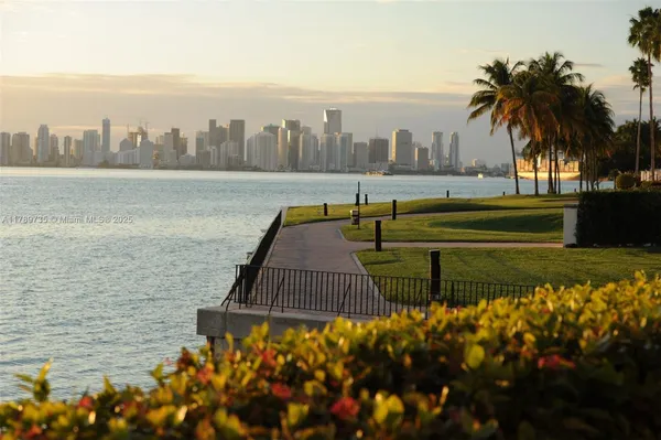 a view of a city with an ocean view