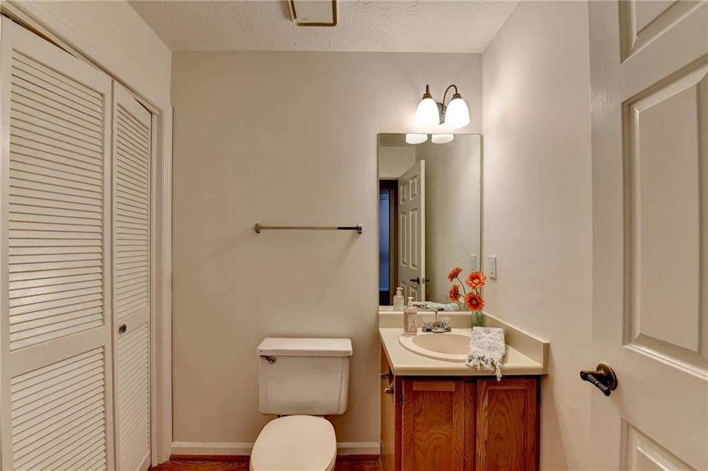 3492 Tulip Tree Lane Duluth, GA 30096 - Photo 14 of 35 a bathroom with a sink and a mirror