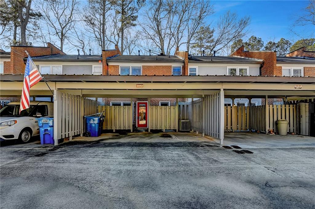 3492 Tulip Tree Lane Duluth, GA 30096 - Photo 23 of 35 a view of a car park in front of building