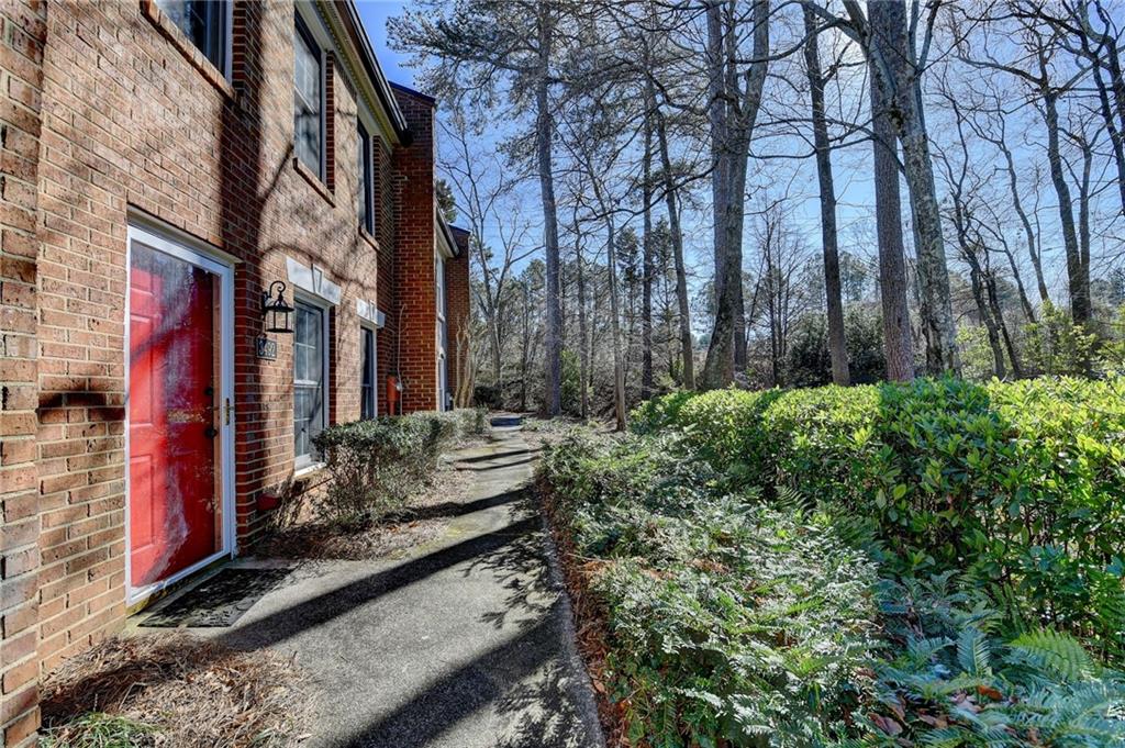 3492 Tulip Tree Lane Duluth, GA 30096 - Photo 3 of 35 a view of a house with backyard and sitting area