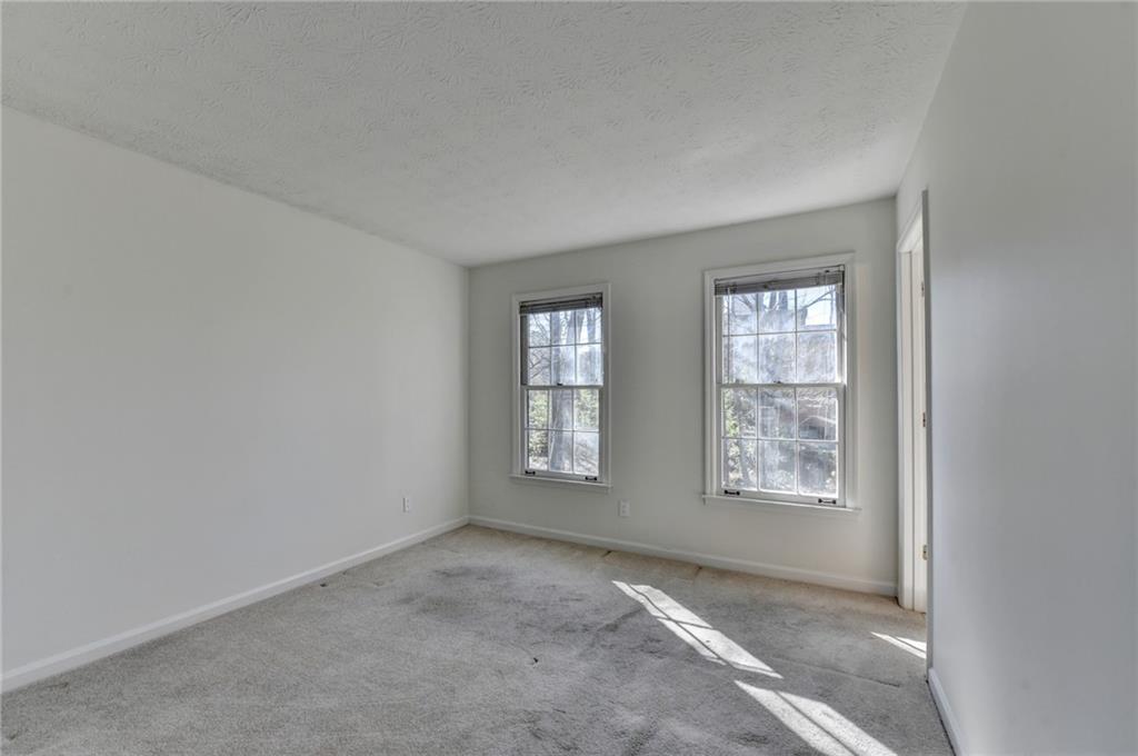 3492 Tulip Tree Lane Duluth, GA 30096 - Photo 35 of 35 an empty room with windows