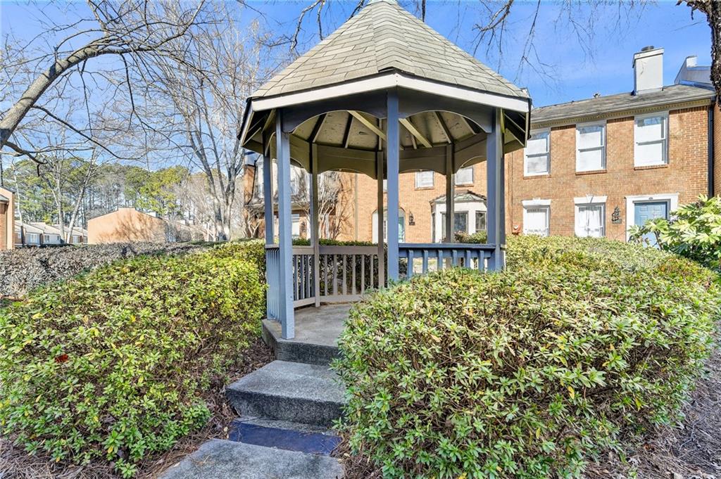 3492 Tulip Tree Lane Duluth, GA 30096 - Photo 4 of 35 a view of a porch with a yard
