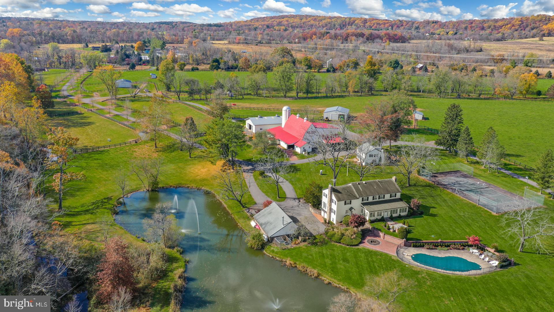 1315 Pineville Road New Hope, PA 18938 - Photo 3 of 51 an aerial view of a house with a garden and lake view