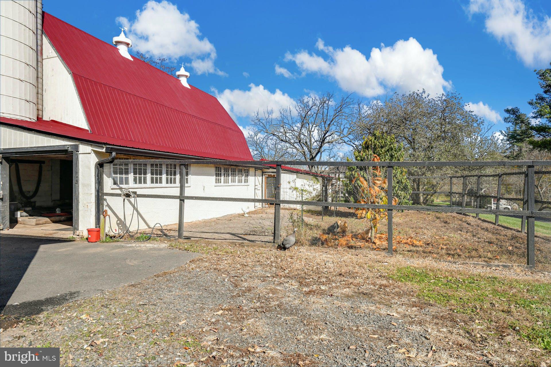 1315 Pineville Road New Hope, PA 18938 - Photo 38 of 51 a view of a house with a backyard porch and sitting area