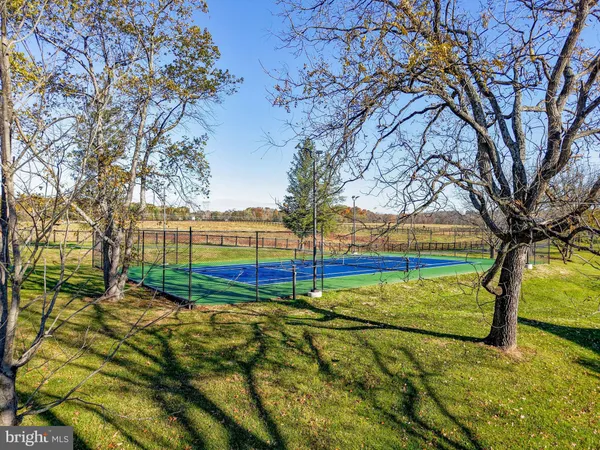 a view of a green field with clear sky