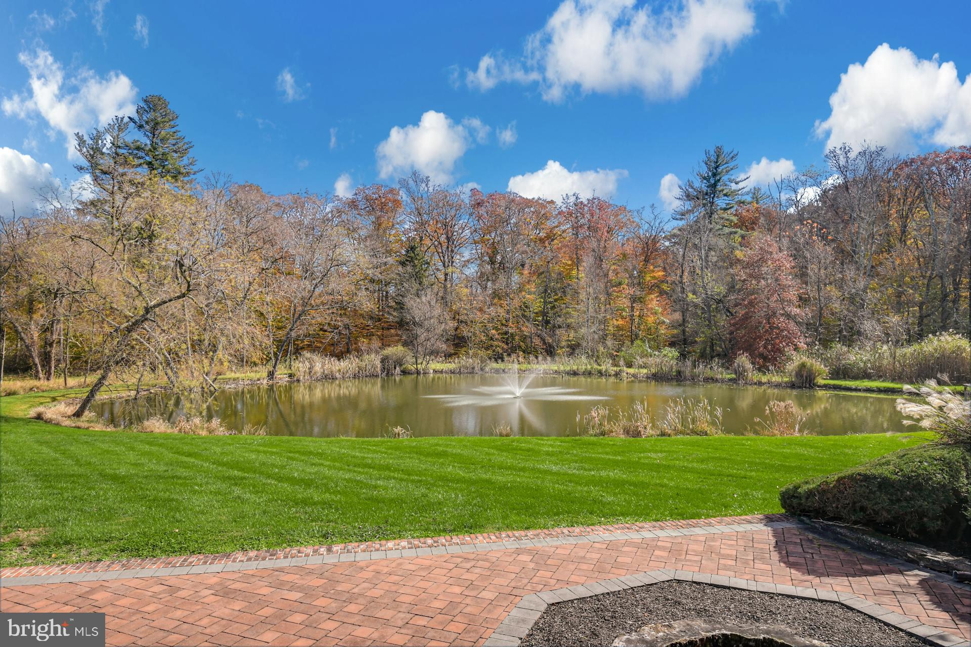 1315 Pineville Road New Hope, PA 18938 - Photo 55 of 58 a view of a lake with a yard and large trees