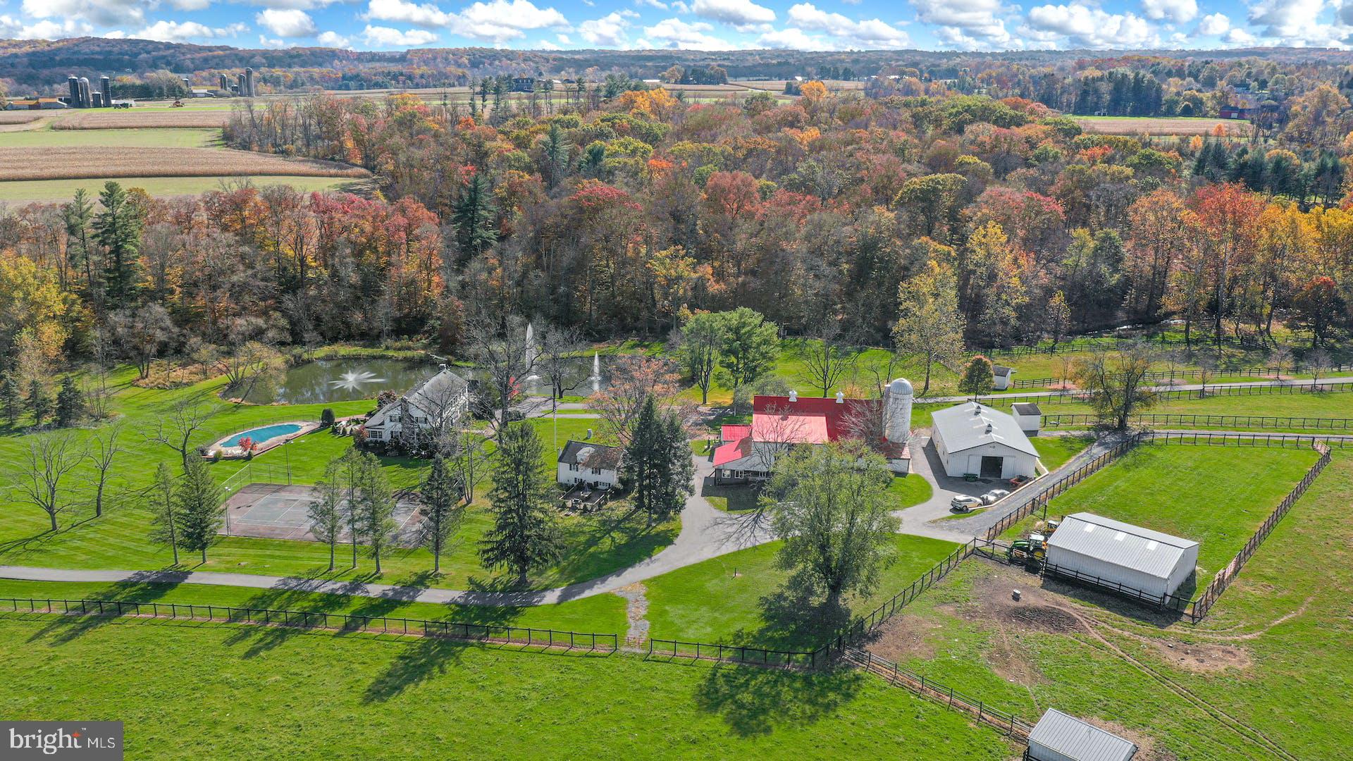 1315 Pineville Road New Hope, PA 18938 - Photo 7 of 51 a view of a tennis ground with a table and chairs