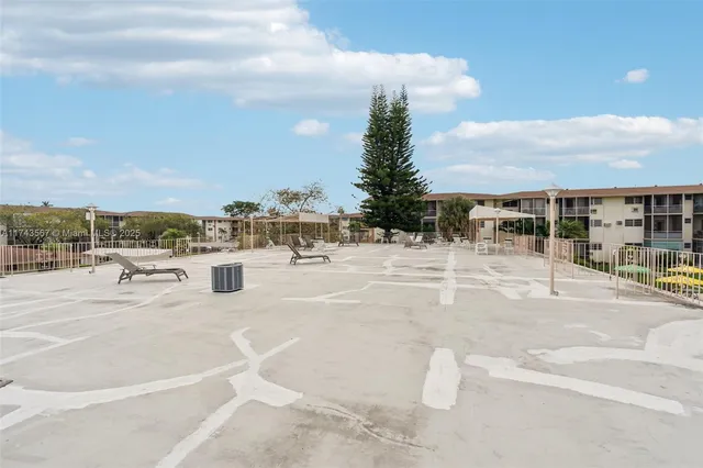 a view of a swimming pool with a terrace