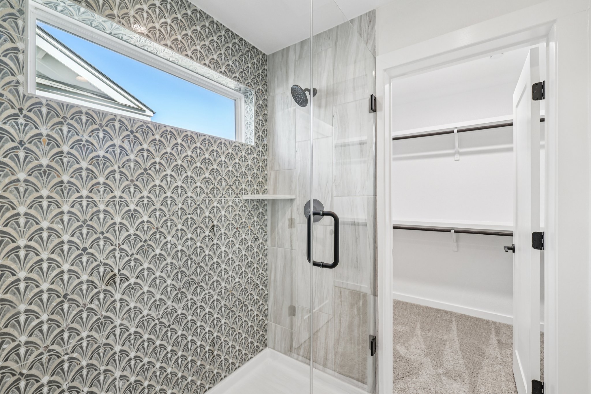 2414 Drew Lane, Unit 3 Austin, TX 78748 - Photo 16 of 18 Full bathroom with a spacious closet and a shower stall