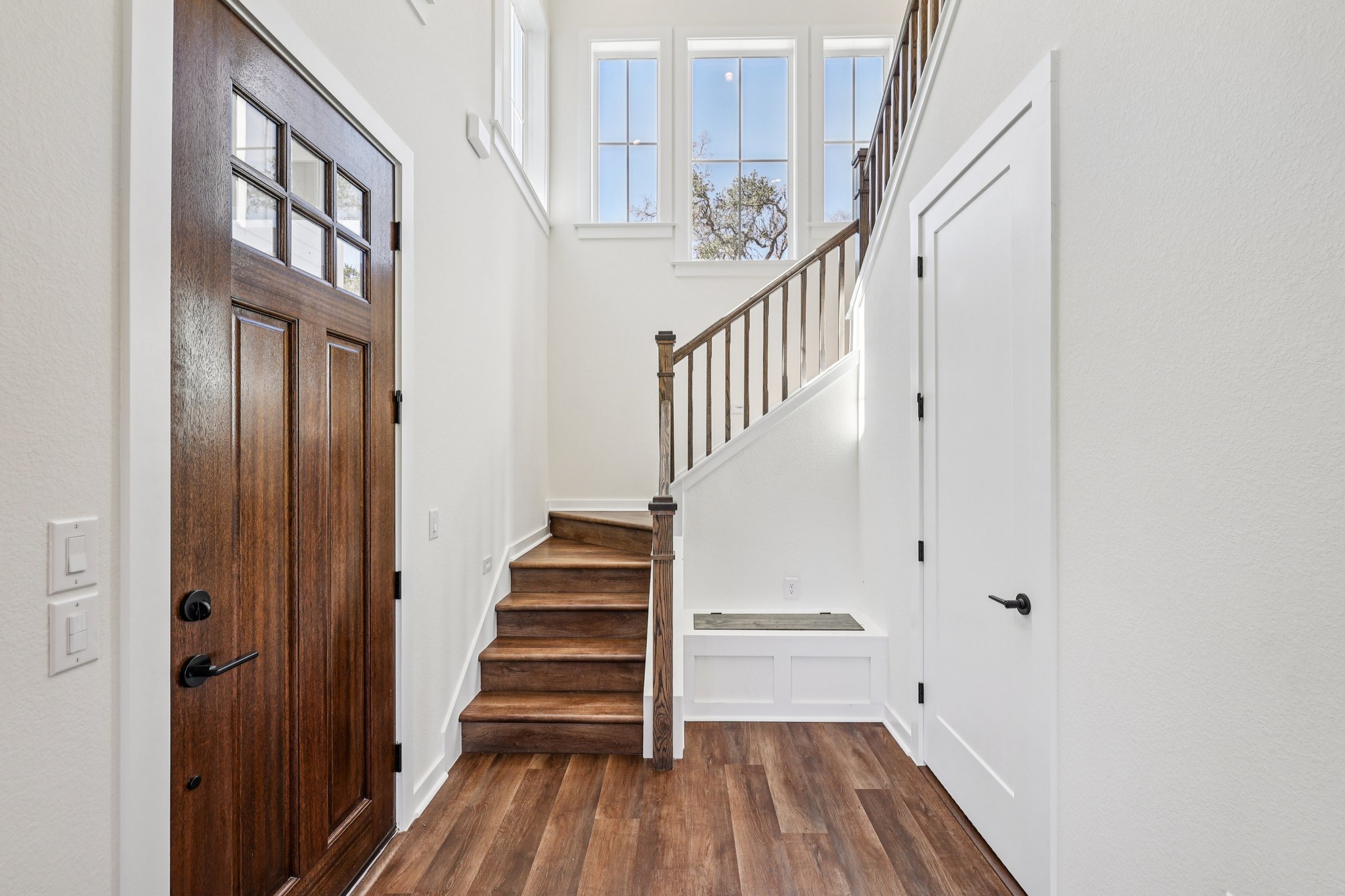 2414 Drew Lane, Unit 3 Austin, TX 78748 - Photo 4 of 18 Entryway featuring dark wood-style floors and a high ceiling