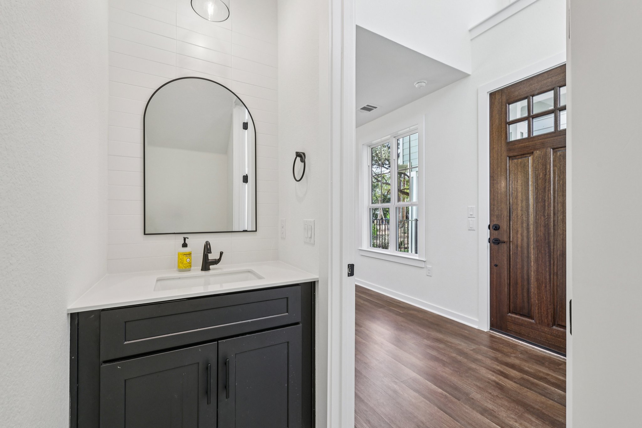 2414 Drew Lane, Unit 3 Austin, TX 78748 - Photo 9 of 18 Bathroom with vanity and dark wood finished floors