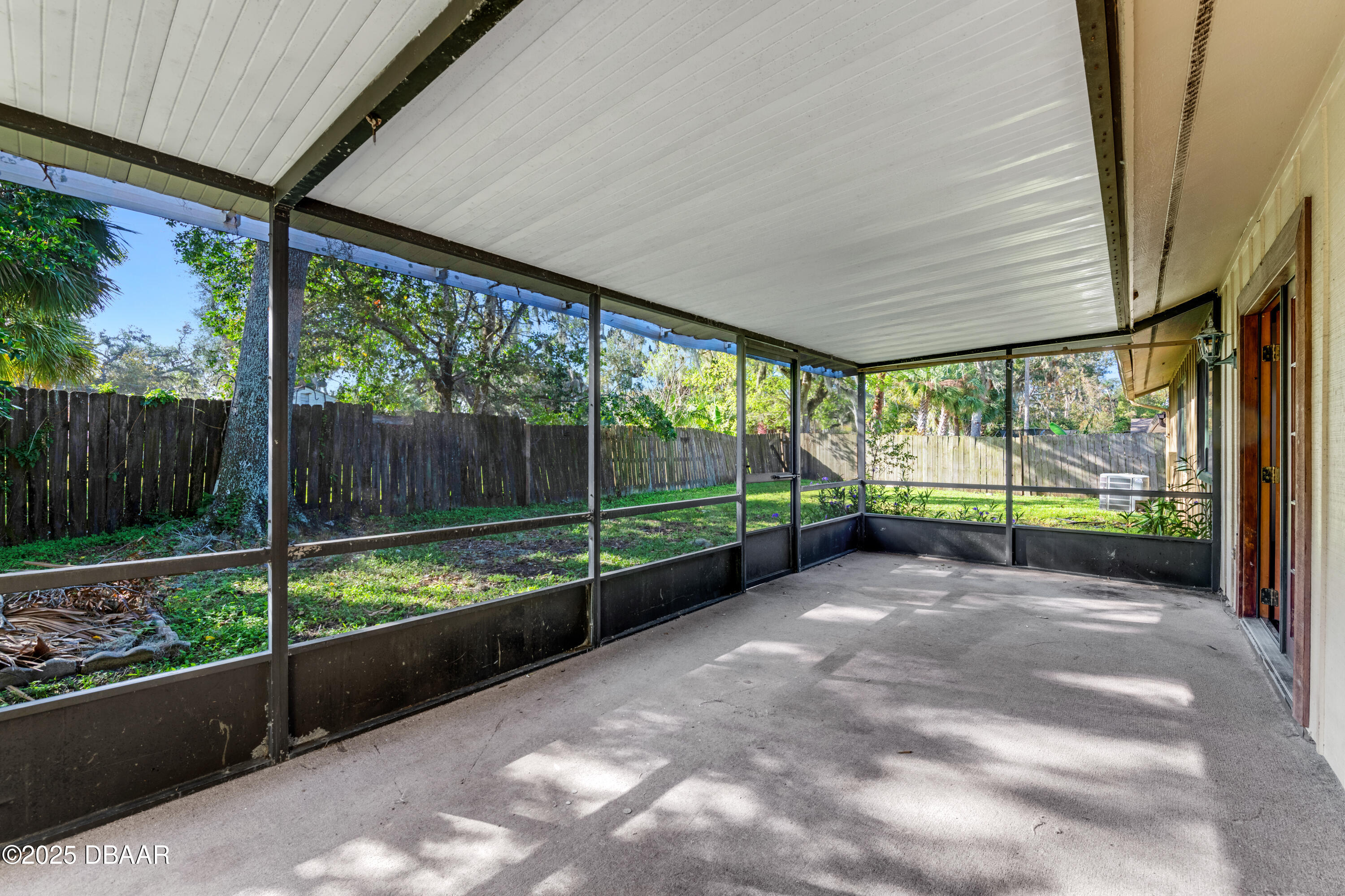 500 Sandy Oaks Boulevard Ormond Beach, FL 32174 - Photo 23 of 31 a view of a room with wooden floor