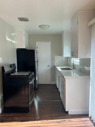 531 Piazza Drive, Unit A Mountain View, CA 94043 - Photo 5 of 15 a kitchen with stainless steel appliances granite countertop a sink stove and refrigerator