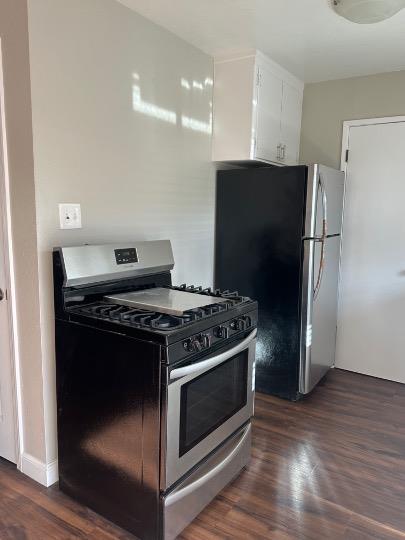 531 Piazza Drive, Unit A Mountain View, CA 94043 - Photo 6 of 15 a stove top oven sitting inside of a kitchen