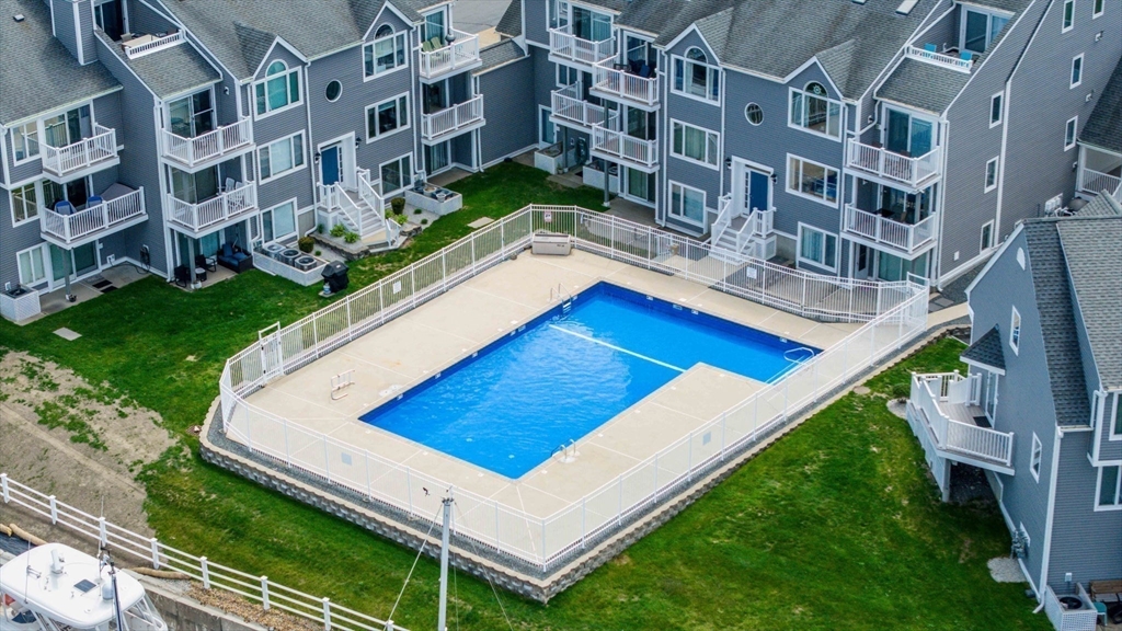 700 Shore Drive, Unit 509 Fall River, MA 02721 - Photo 23 of 25 a view of an buildings with a backyard