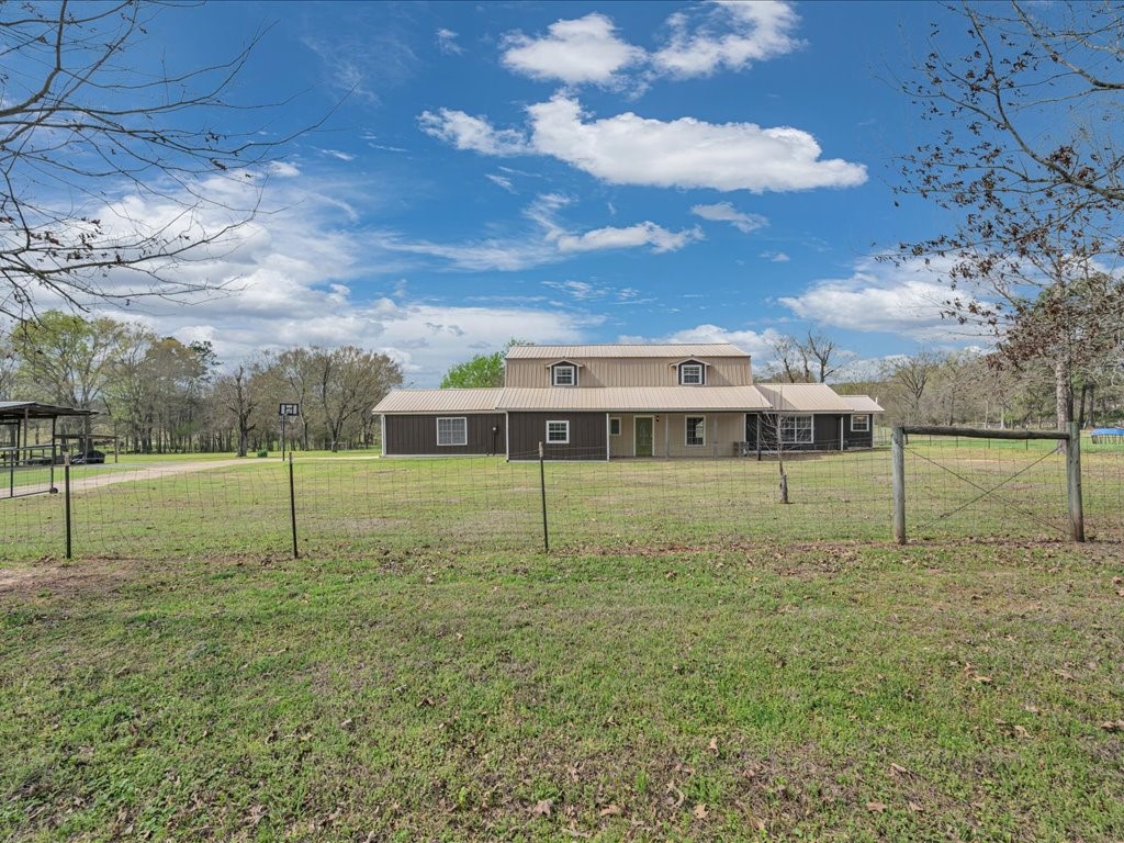 1013 Dewitt Hinson Road Pollok, TX 75969 - Photo 1 of 33 a view of a house with a backyard
