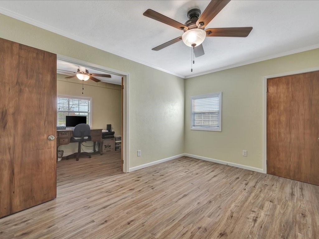 1013 Dewitt Hinson Road Pollok, TX 75969 - Photo 15 of 33 a view of livingroom with hardwood floor and ceiling fan