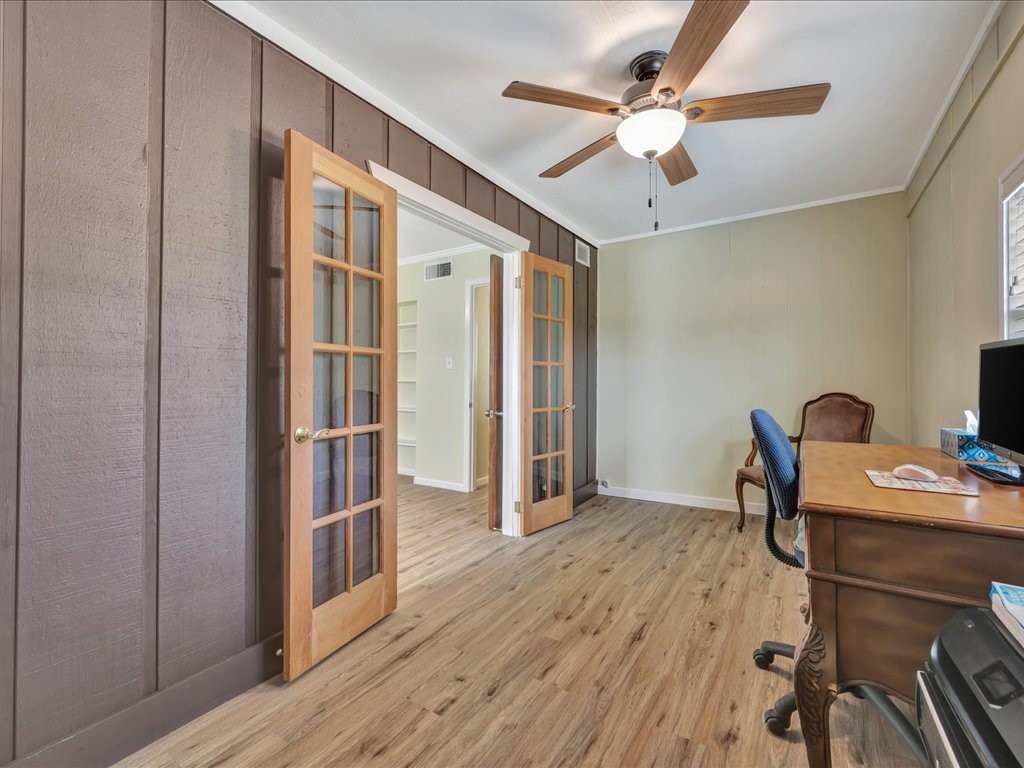 1013 Dewitt Hinson Road Pollok, TX 75969 - Photo 16 of 33 a workspace with wooden floor