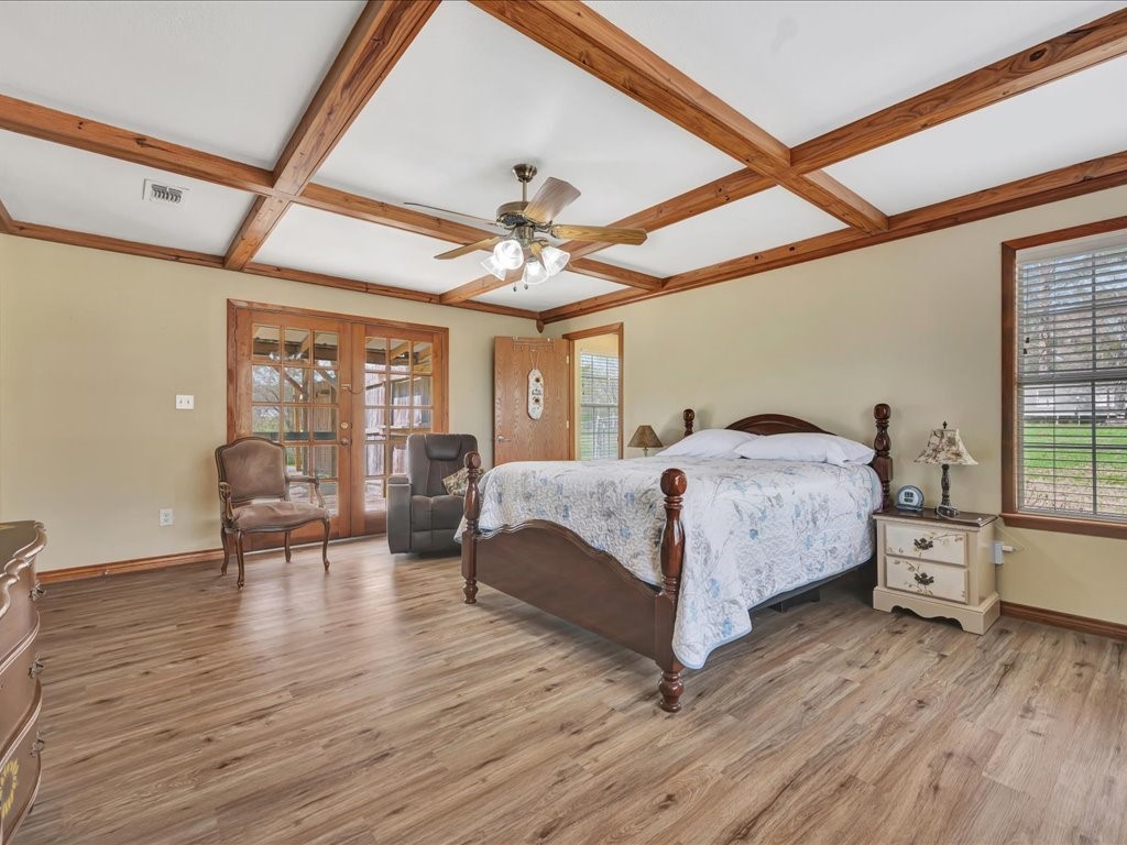 1013 Dewitt Hinson Road Pollok, TX 75969 - Photo 17 of 33 a bedroom with a bed a table and chair