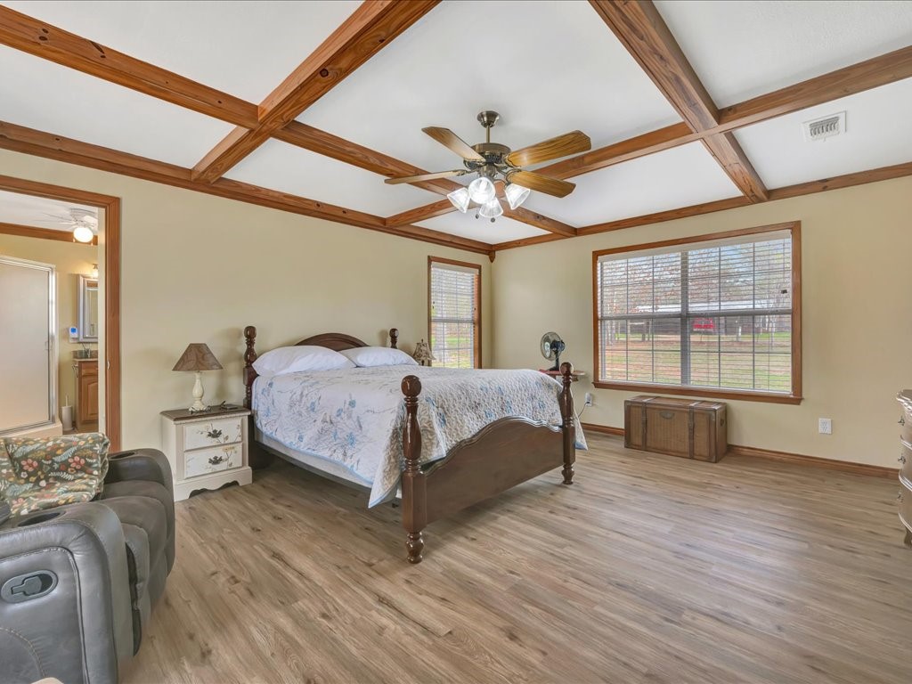 1013 Dewitt Hinson Road Pollok, TX 75969 - Photo 18 of 33 a bedroom with a bed and a large window