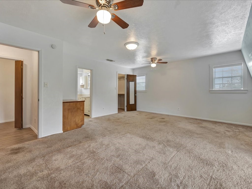 1013 Dewitt Hinson Road Pollok, TX 75969 - Photo 24 of 33 a view of an empty room with a chandelier fan