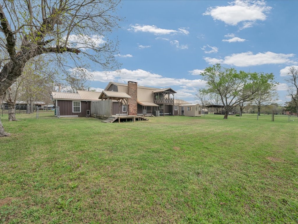 1013 Dewitt Hinson Road Pollok, TX 75969 - Photo 28 of 33 a view of a house with a big yard