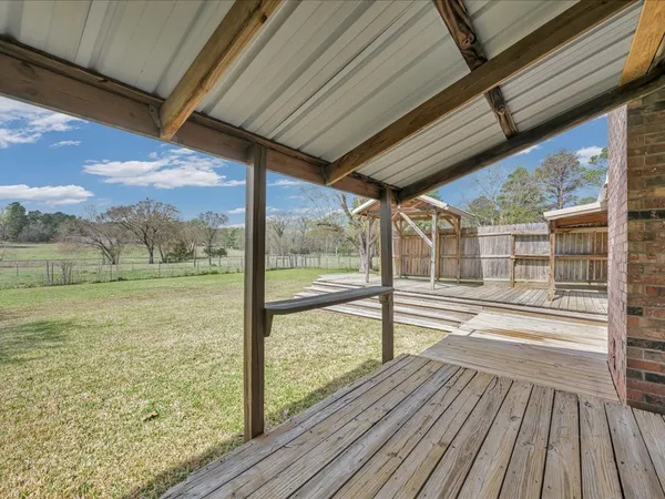a view of porch with wooden floor and outdoor space