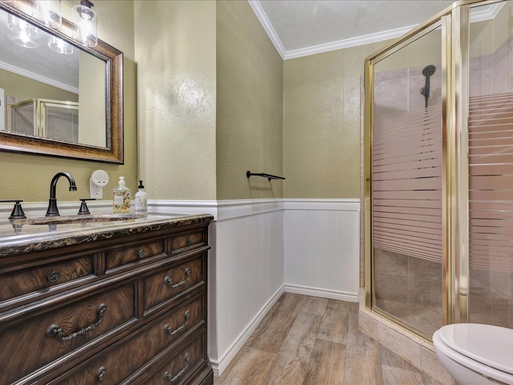 1013 Dewitt Hinson Road Pollok, TX 75969 - Photo 7 of 33 a bathroom with a double vanity sink and mirror