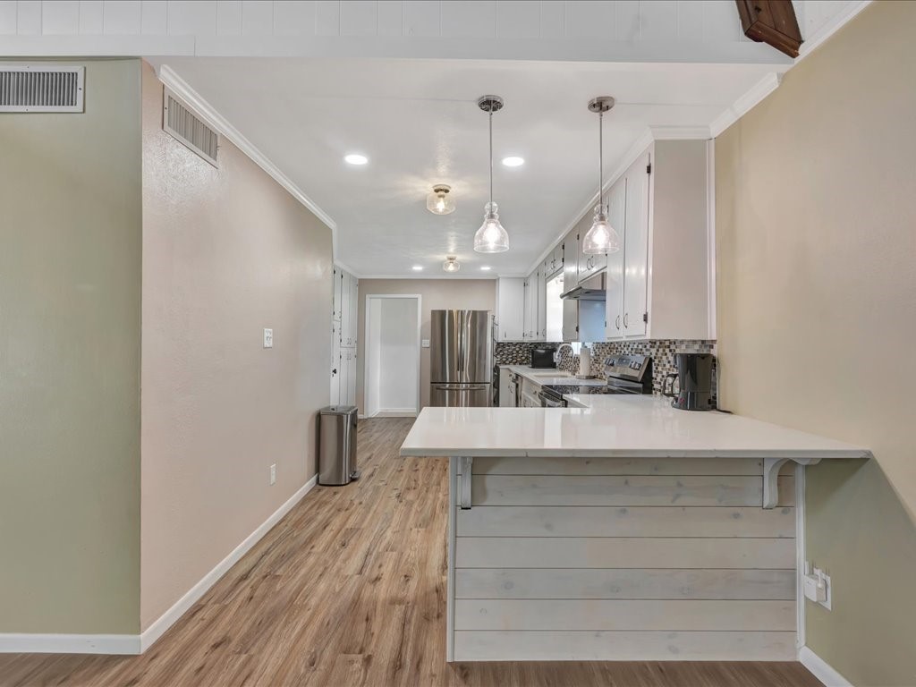 1013 Dewitt Hinson Road Pollok, TX 75969 - Photo 10 of 33 a large white kitchen with a large window