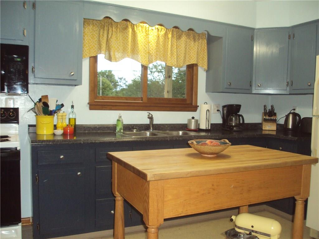8307 Lamor Road Mercer, PA 16137 - Photo 2 of 17 View of kitchen from dining room doorway
