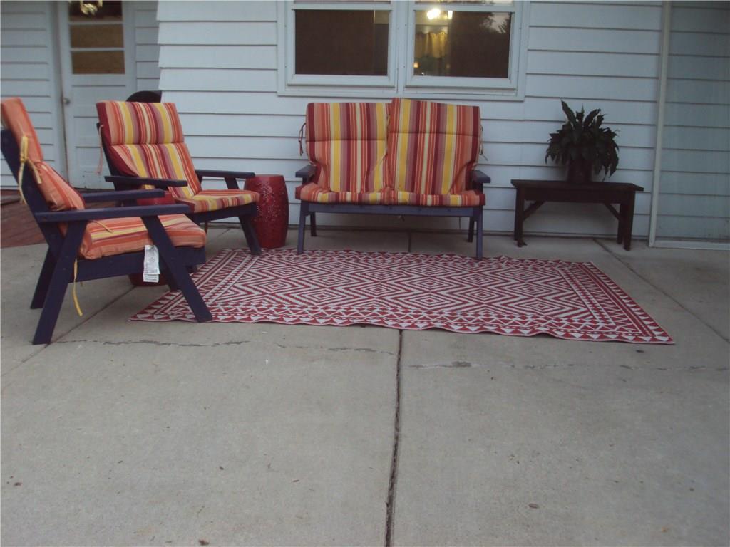 8307 Lamor Road Mercer, PA 16137 - Photo 7 of 17 Patio (window into dining room, door on left man door into garage)