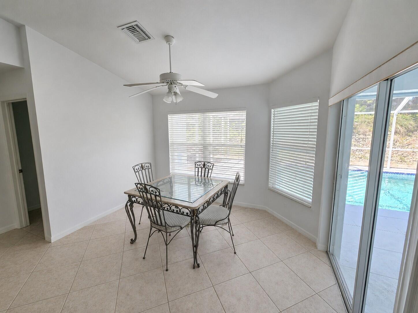 2049 San Marco Road Marco Island, FL 34145 - Photo 35 of 71 Dining Room to Pool with AI Editing
