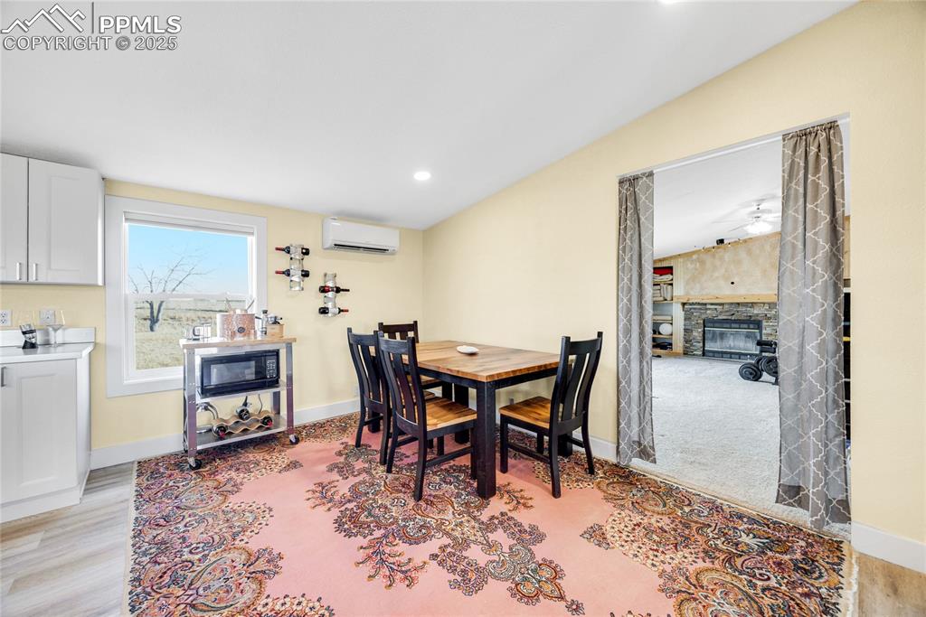 5865 East Blaney Road Peyton, CO 80831 - Photo 12 of 49 a view of a dining room with furniture