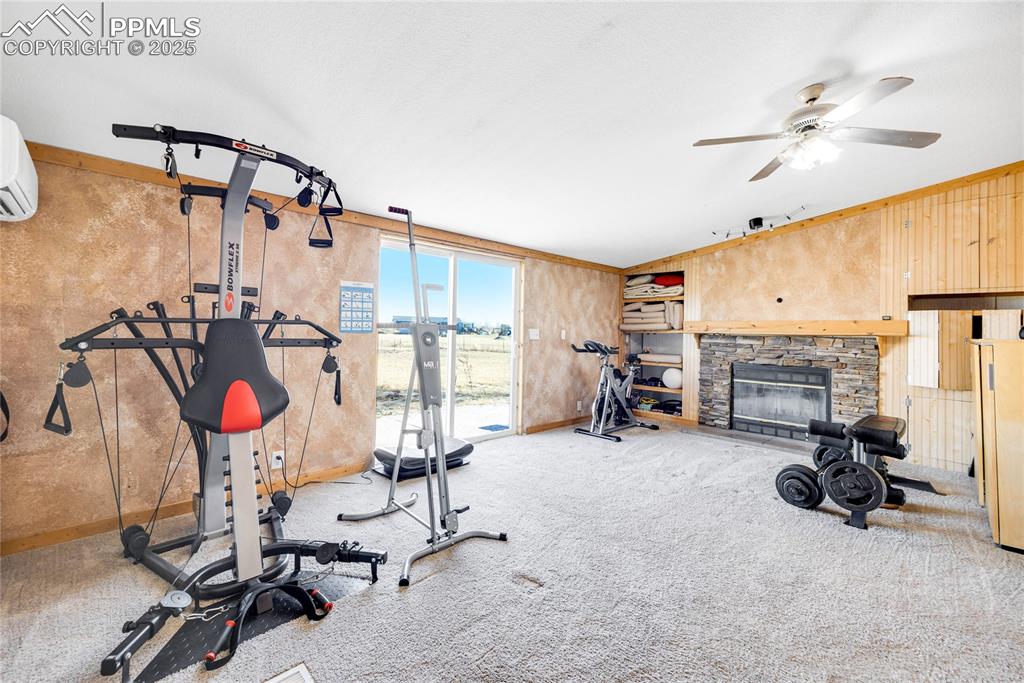 5865 East Blaney Road Peyton, CO 80831 - Photo 24 of 49 a view of a room with gym equipment