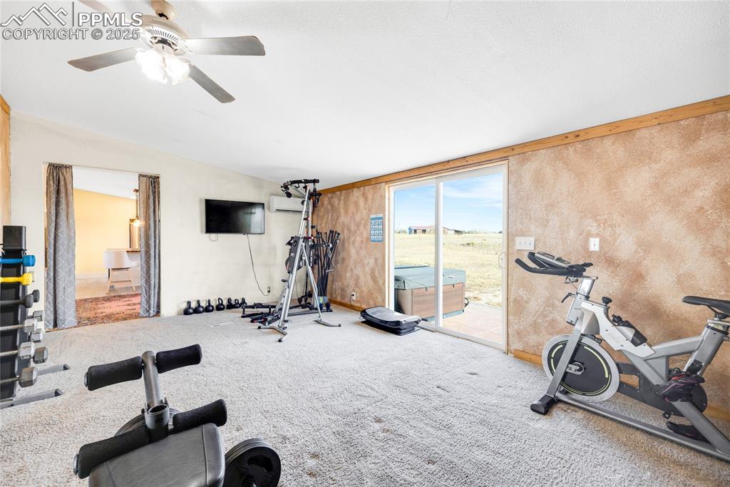 5865 East Blaney Road Peyton, CO 80831 - Photo 25 of 49 a view of a room with gym equipment