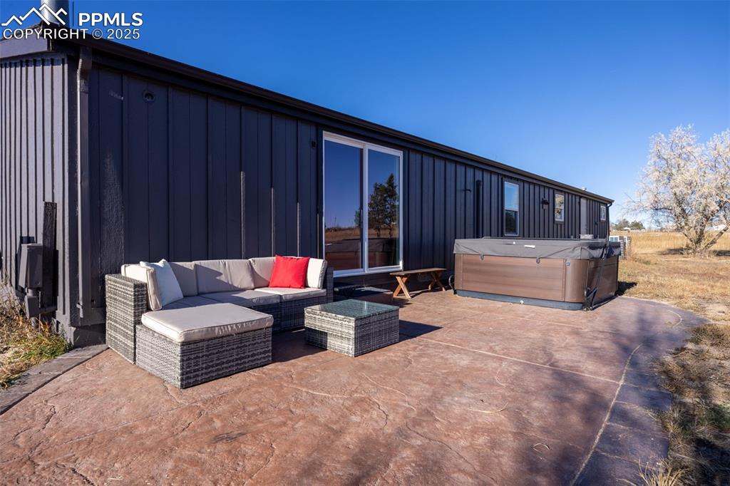 5865 East Blaney Road Peyton, CO 80831 - Photo 32 of 49 a view of a couches in the patio