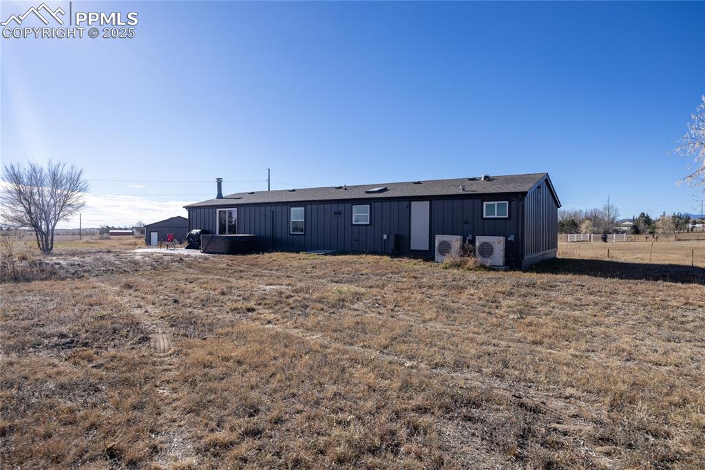 5865 East Blaney Road Peyton, CO 80831 - Photo 33 of 49 a view of a house next to a yard