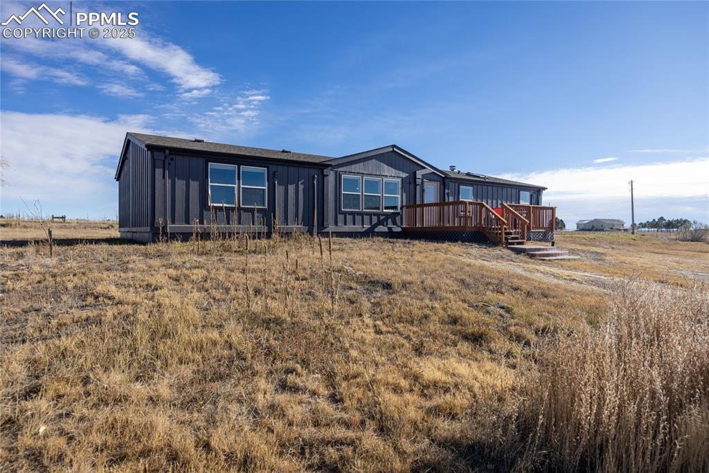 5865 East Blaney Road Peyton, CO 80831 - Photo 38 of 49 a big house with a yard