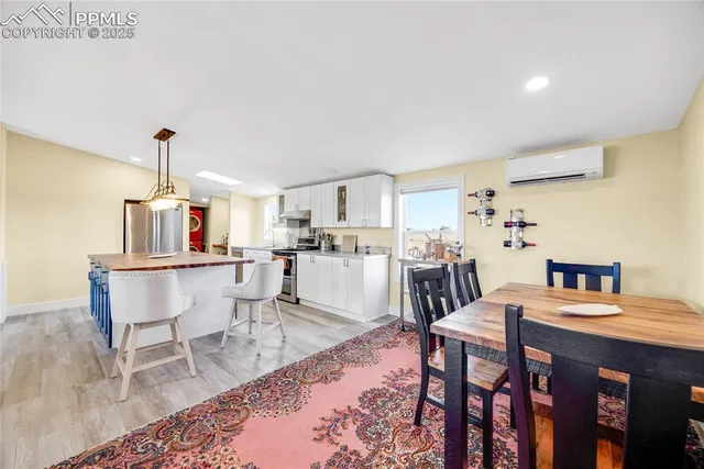 a view of a dining room with furniture