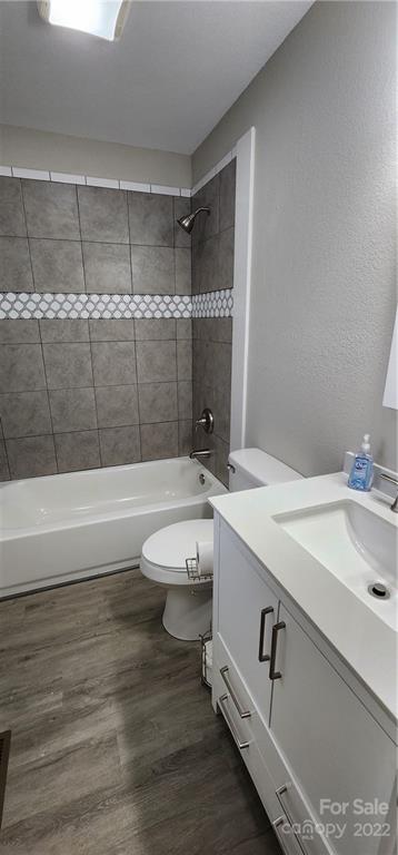 90 Ash Drive Maggie Valley, NC 28751 - Photo 25 of 27 a bathroom with a sink a toilet and shower