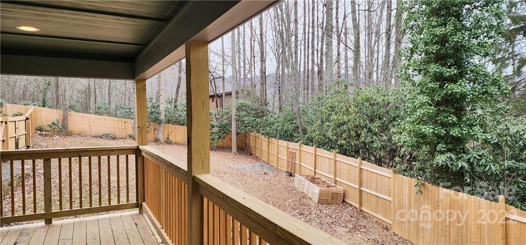 90 Ash Drive Maggie Valley, NC 28751 - Photo 5 of 27 a view of a balcony with wooden floor