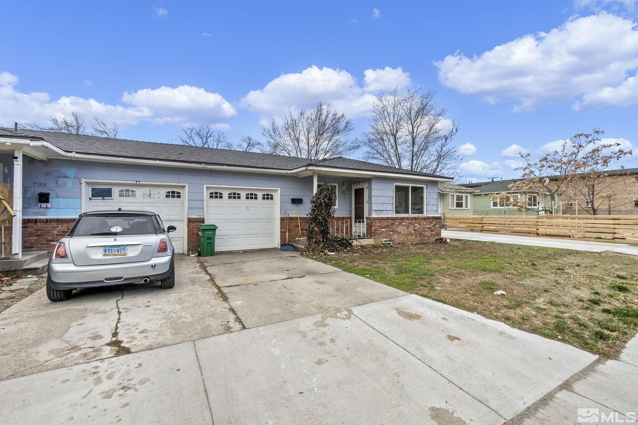796-798 Moran Street Reno, NV 89502 - Photo 3 of 11 a front view of a house with garden