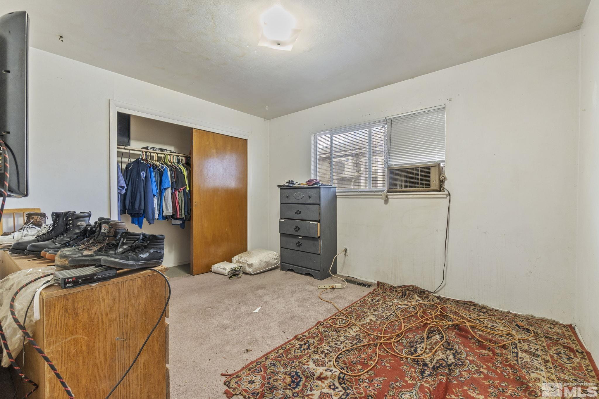 796-798 Moran Street Reno, NV 89502 - Photo 9 of 11 a bedroom with a bed and furniture