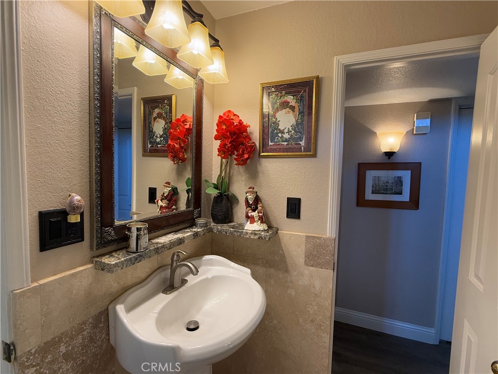 40820 Oak Ridge Drive Three Rivers, CA 93271 - Photo 16 of 65 a bathroom with a sink and a mirror