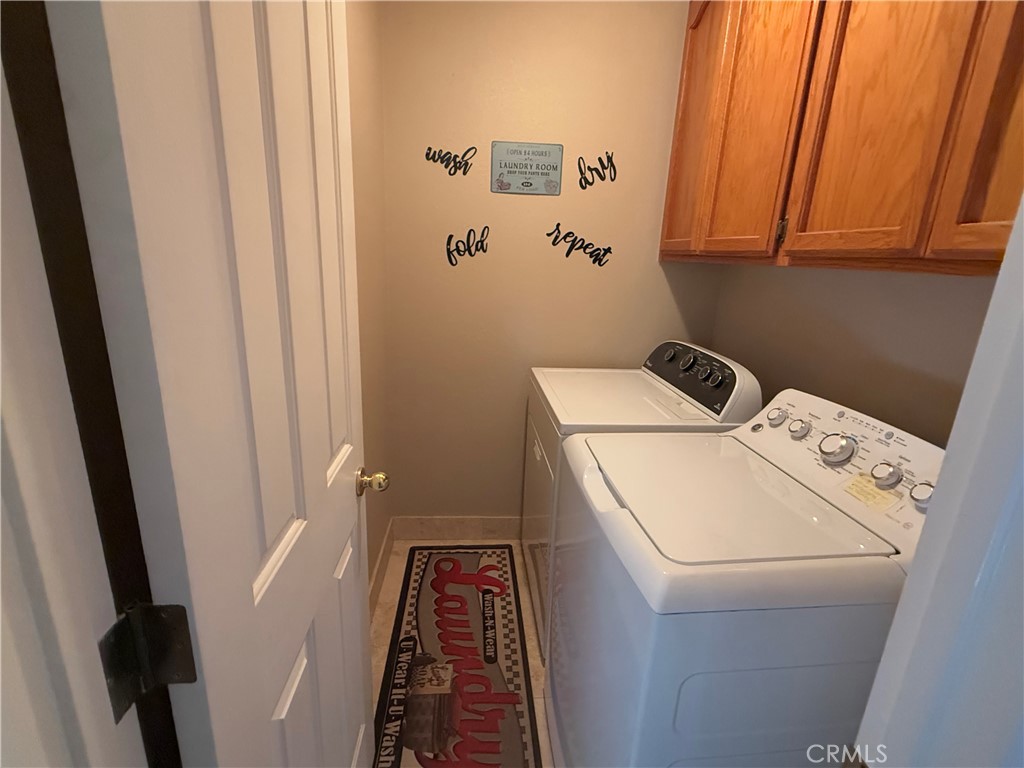 40820 Oak Ridge Drive Three Rivers, CA 93271 - Photo 22 of 65 a utility room with dryer and washer