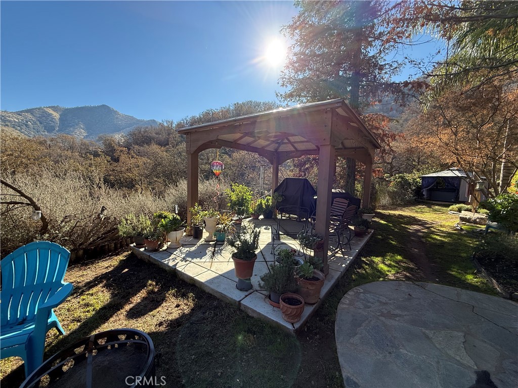 40820 Oak Ridge Drive Three Rivers, CA 93271 - Photo 35 of 65 a view of a chairs and table in the patio