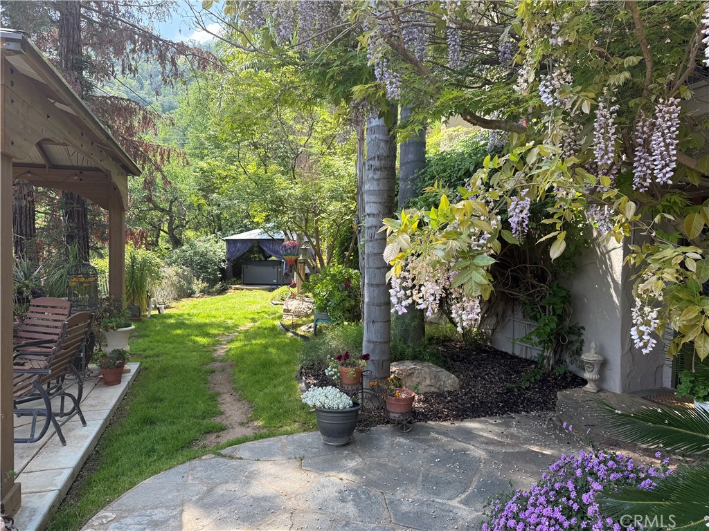 40820 Oak Ridge Drive Three Rivers, CA 93271 - Photo 44 of 65 a view of a garden with patio